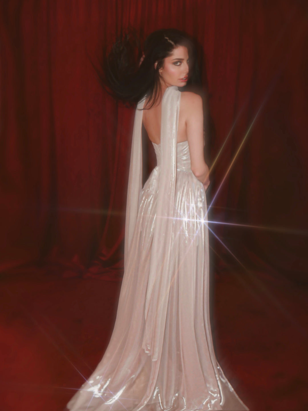 Wuthering Hearts metallic chiffon wedding dress back view with flowing skirt and matching neck scarf
