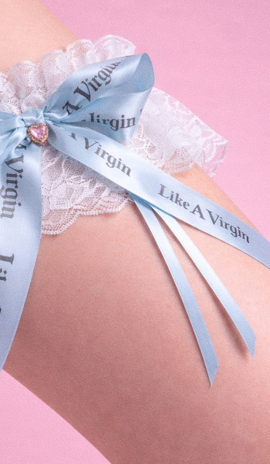 Like A Virgin baby blue satin bow bridal garter with printed ribbon and crystal heart charm on lace band