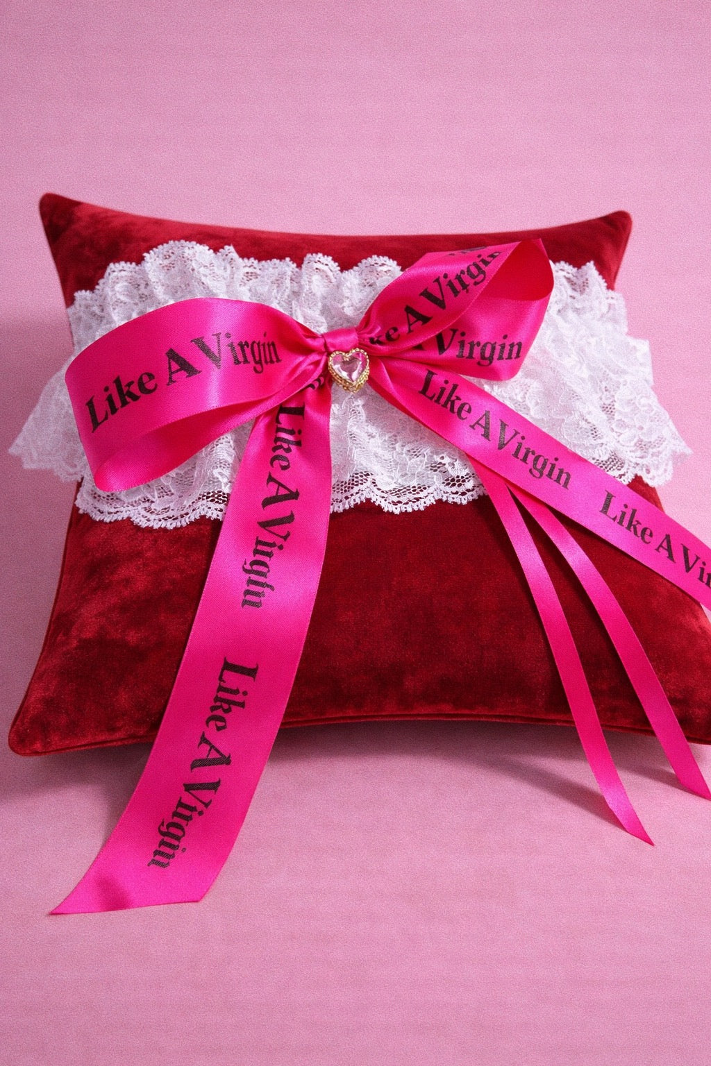 Like A Virgin hot pink satin statement garter with oversized printed ribbon and white lace